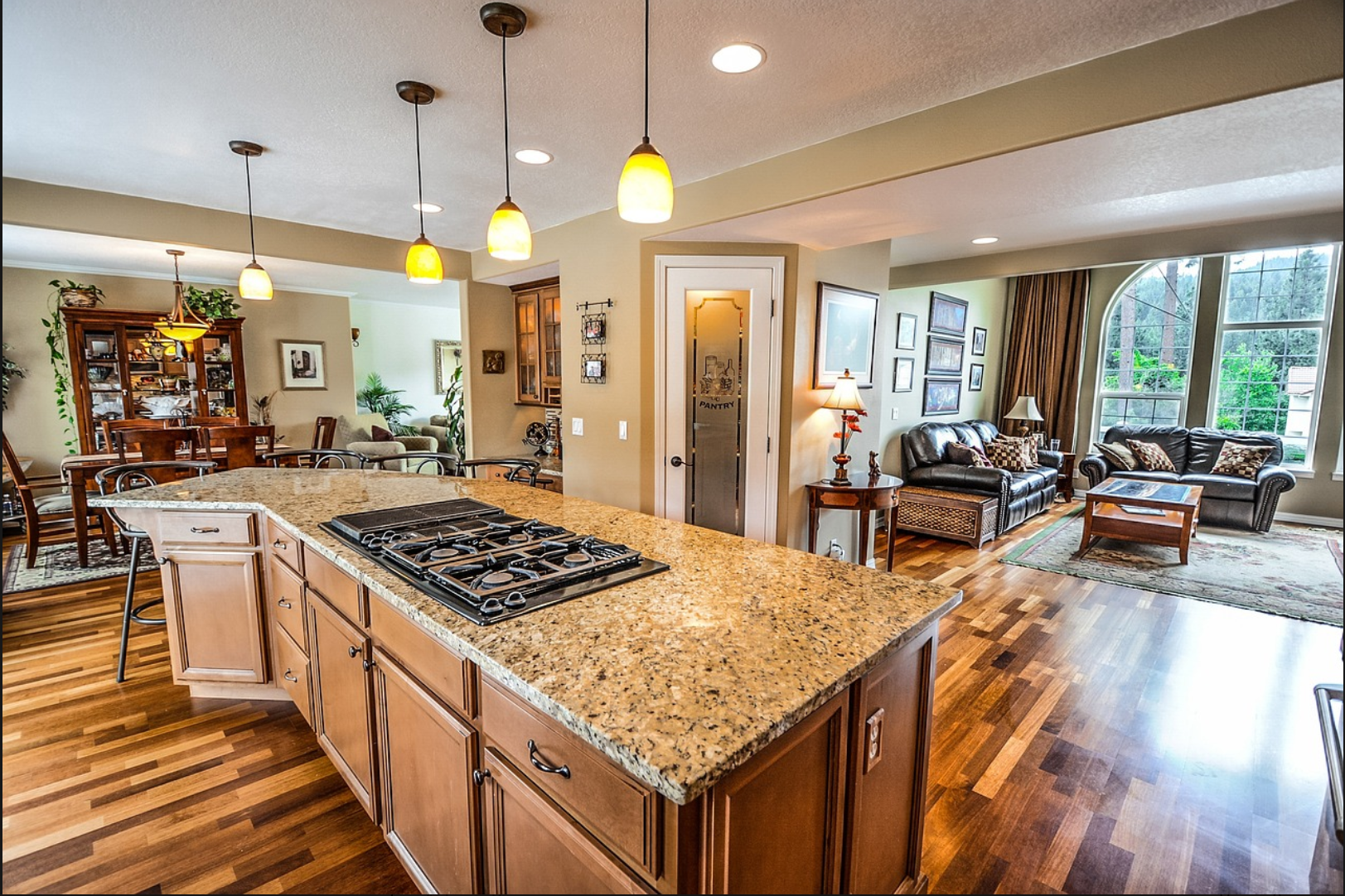 Kitchen remodel with granite island and built-in gas range
